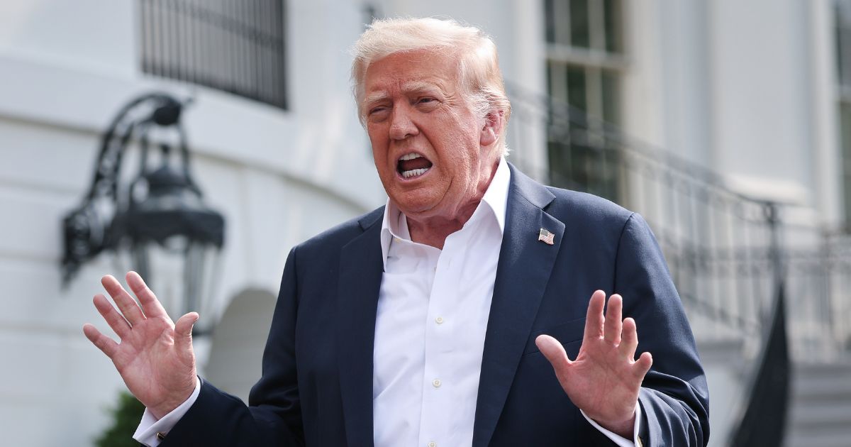 President Donald Trump answers questions outside the White House in Washington, DC, on July 11, 2025.