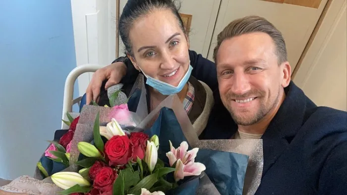 Keith Mason posing with his girlfriend Riona Kelly after bringing her flowers